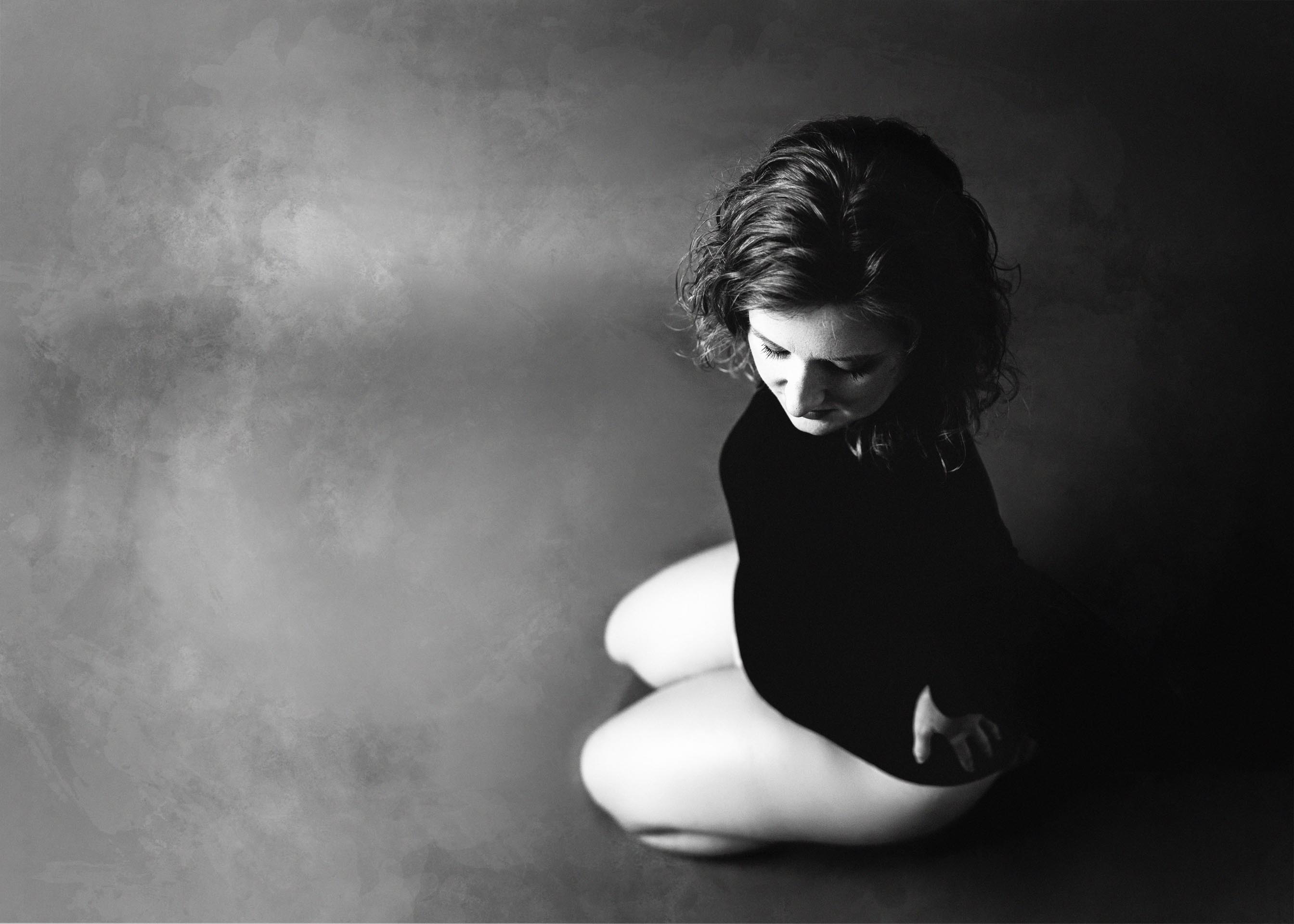 maternity session in black bodysuit in black and white for professional maternity photography session in minneapolis