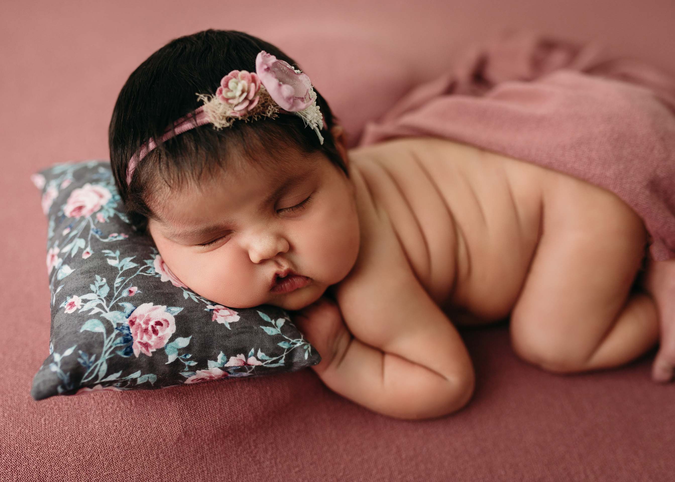 baby girl posed in bum up on mauve backdrop minneapolis minnesota newborn photographer